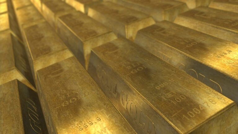 Goldmünzen und Goldbarren zum Vergleich für sichere Goldinvestitionen 2026